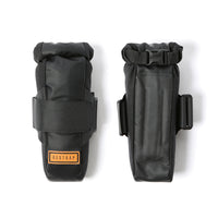 A black Restrap downtube bag featuring a roll-top closure and velcro strap, with padded hypalon back