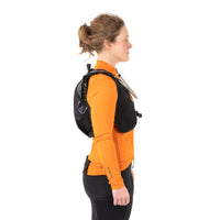 female rider wearing restrap race hydration vest, pictured from the side on a white background