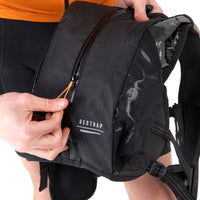 closeup of main compartment zip on restrap race hydration vest