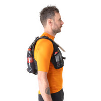 Side profile of a man wearing the restrap race hydration vest