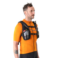 Man wearing restrap race hydration vest, shown from a side-front view