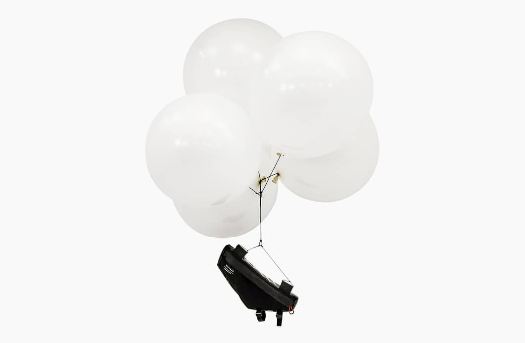 Restrap race frame bag held up by balloons, demonstrating the lightweight construction