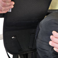 Close up of black Restrap Holster Bar Bag Plus mounted on a bicycle handlebar with the dry bag being removed from the holster