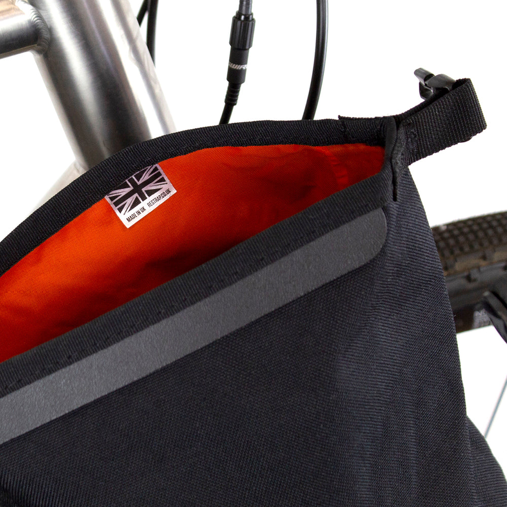 the opening of the restrap fork bag showing the orange lining