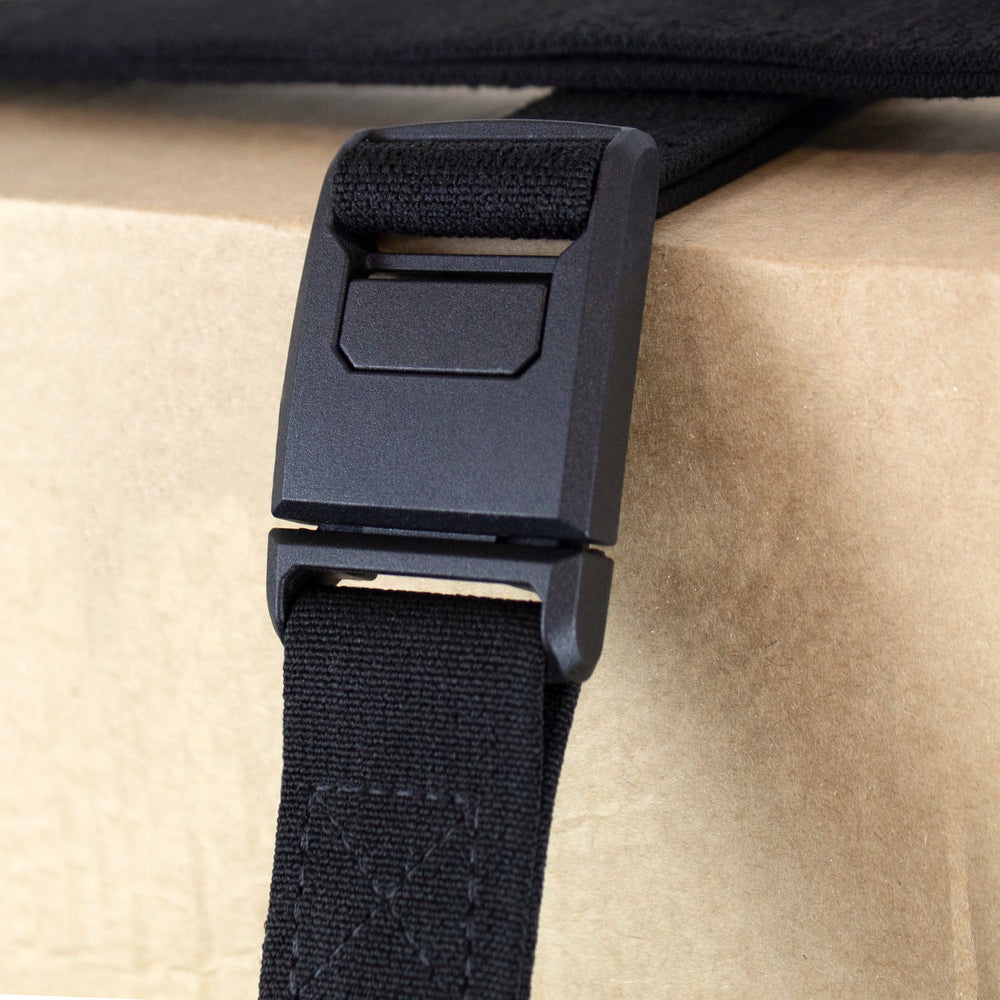 closeup of the magnetic buckles on restrap luggage straps