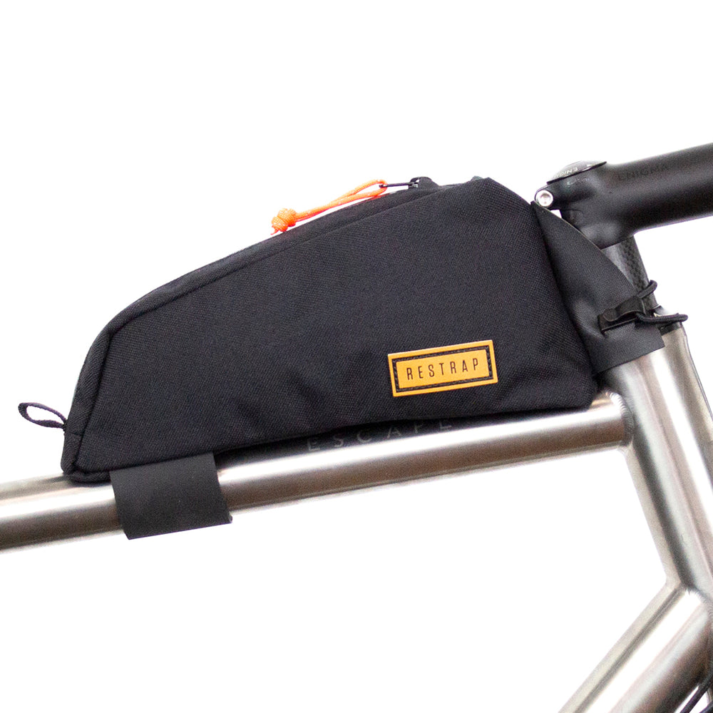restrap top tube bag mounted onto bike on a white background