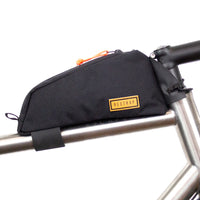 restrap top tube bag mounted onto bike on a white background
