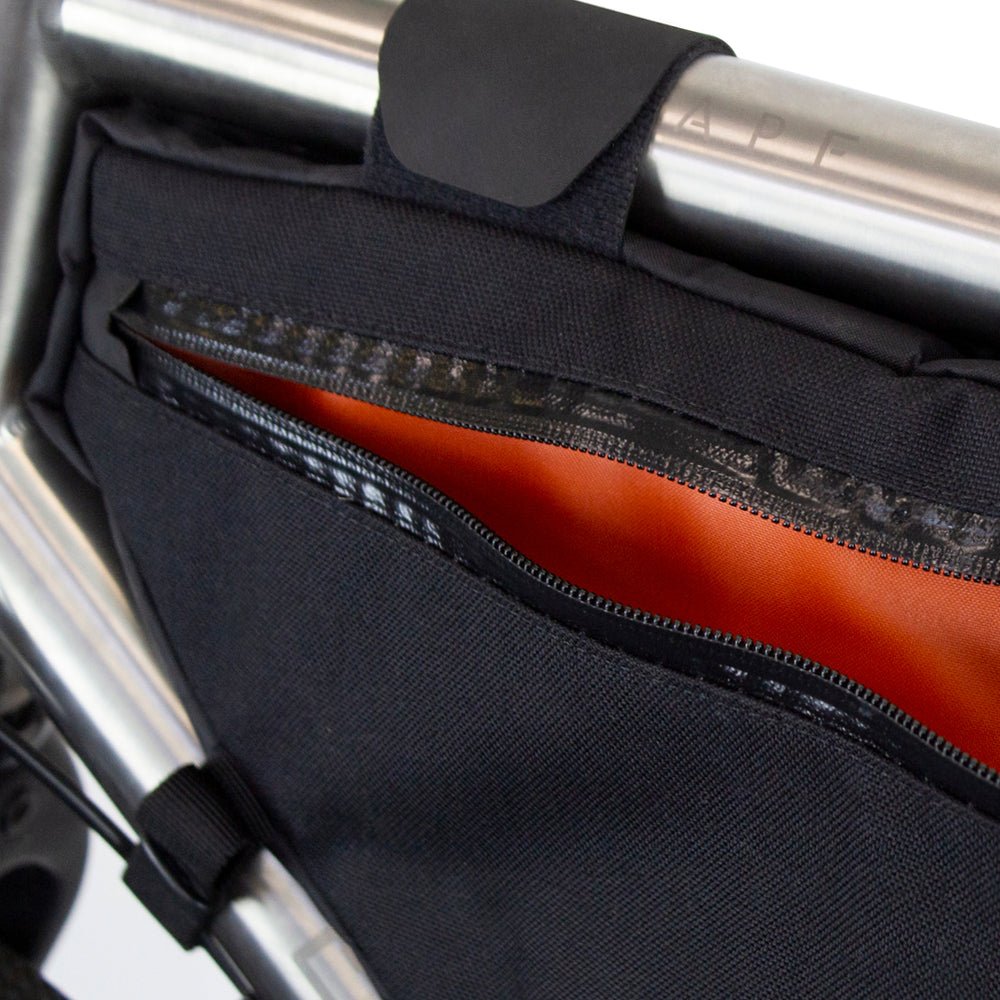 close up of an open restrap frame bag zipper