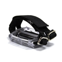 A black Restrap horizontal pedal strap fitted onto a cycling pedal, with visible nylon webbing and metal buckle.